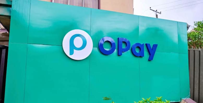 OPay sign on a green wall