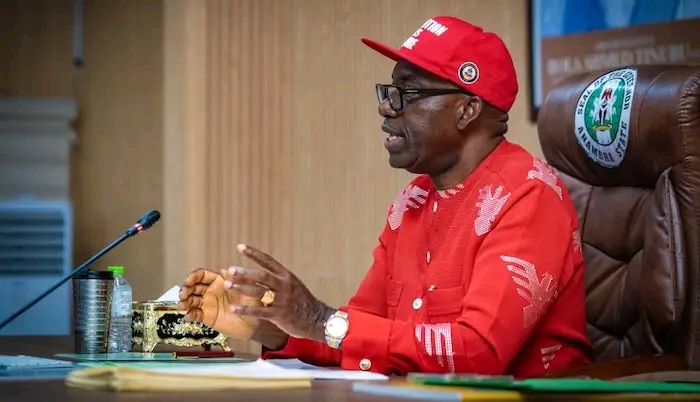 Governor Chukwuma Soludo speaking at a table in Awka